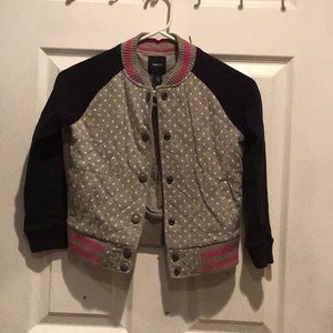 A girls jacket size S (6-7) regular.
